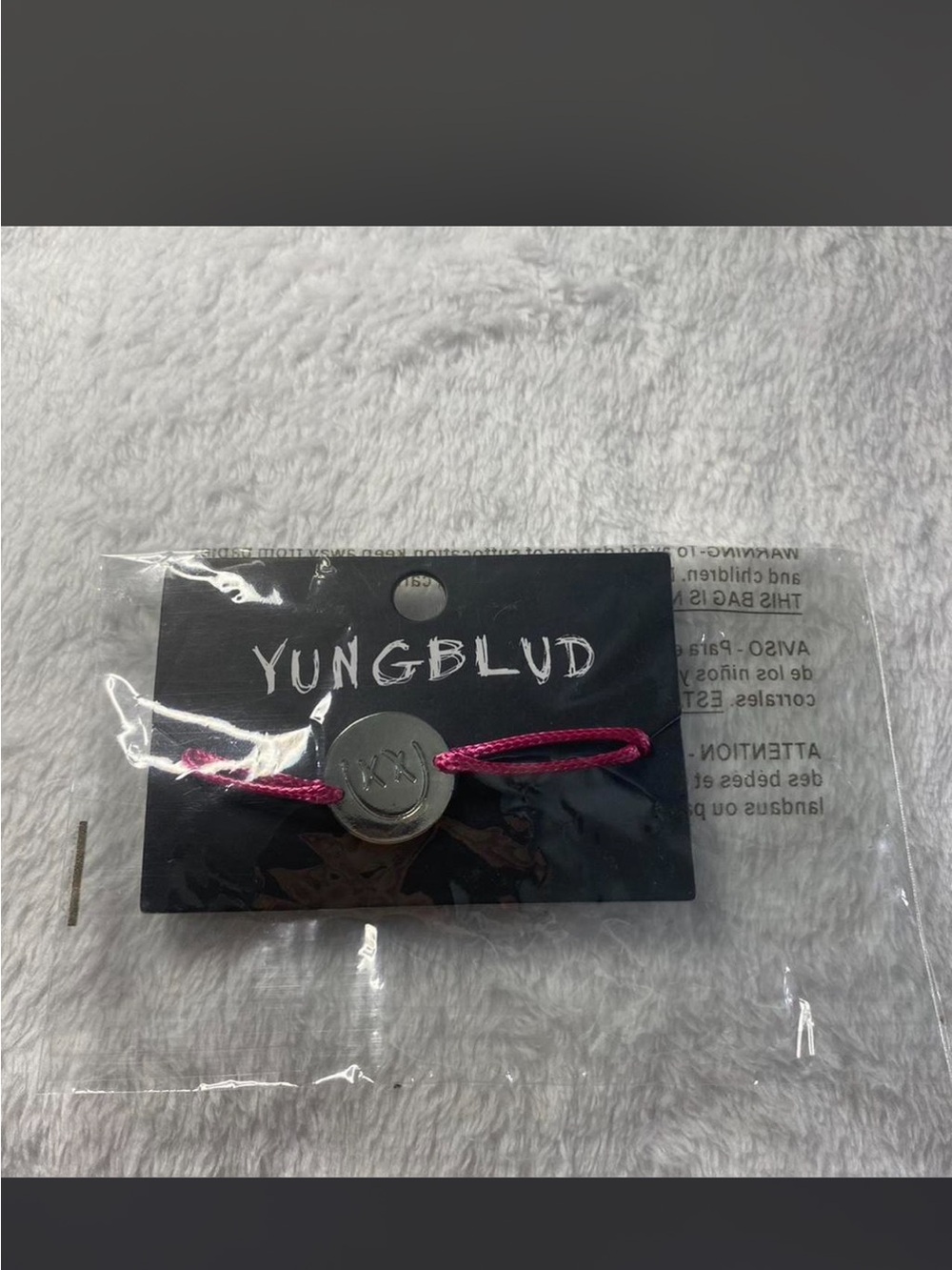 YUNGBLUD Pink Cord Bracelet with Silver 'XXX' Disc